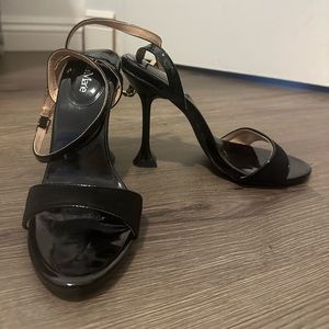 Black high heels slinging back strap
